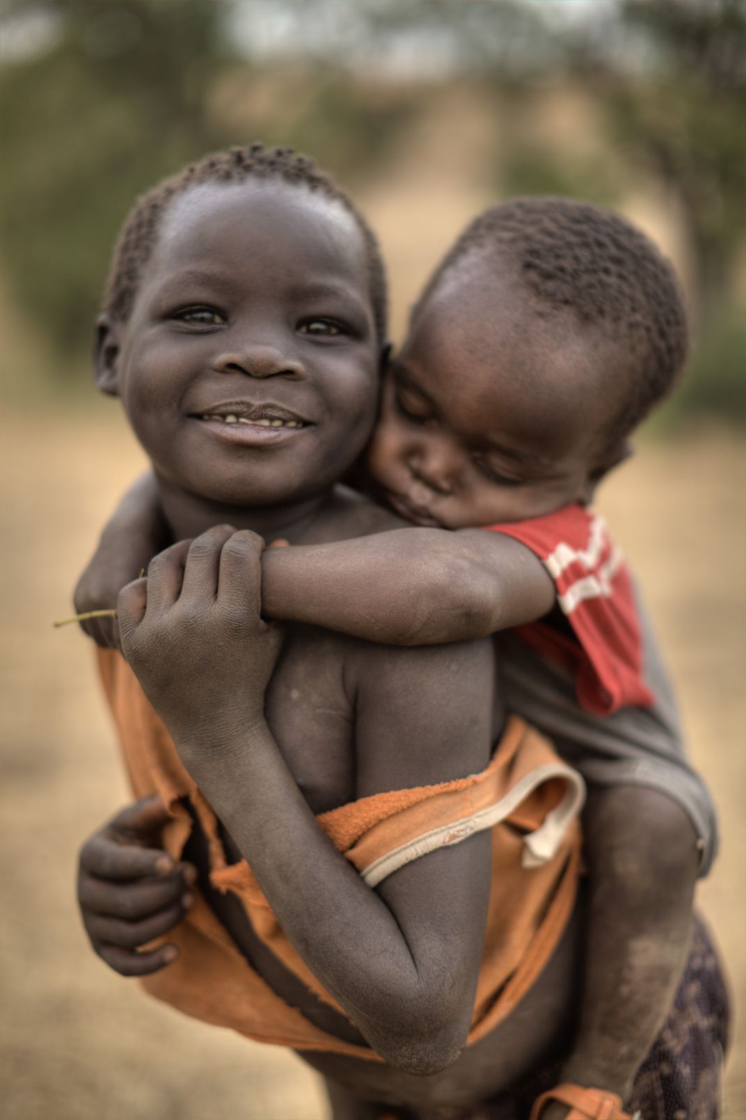 This child was enamored by the sound of my camera and the color of my ...