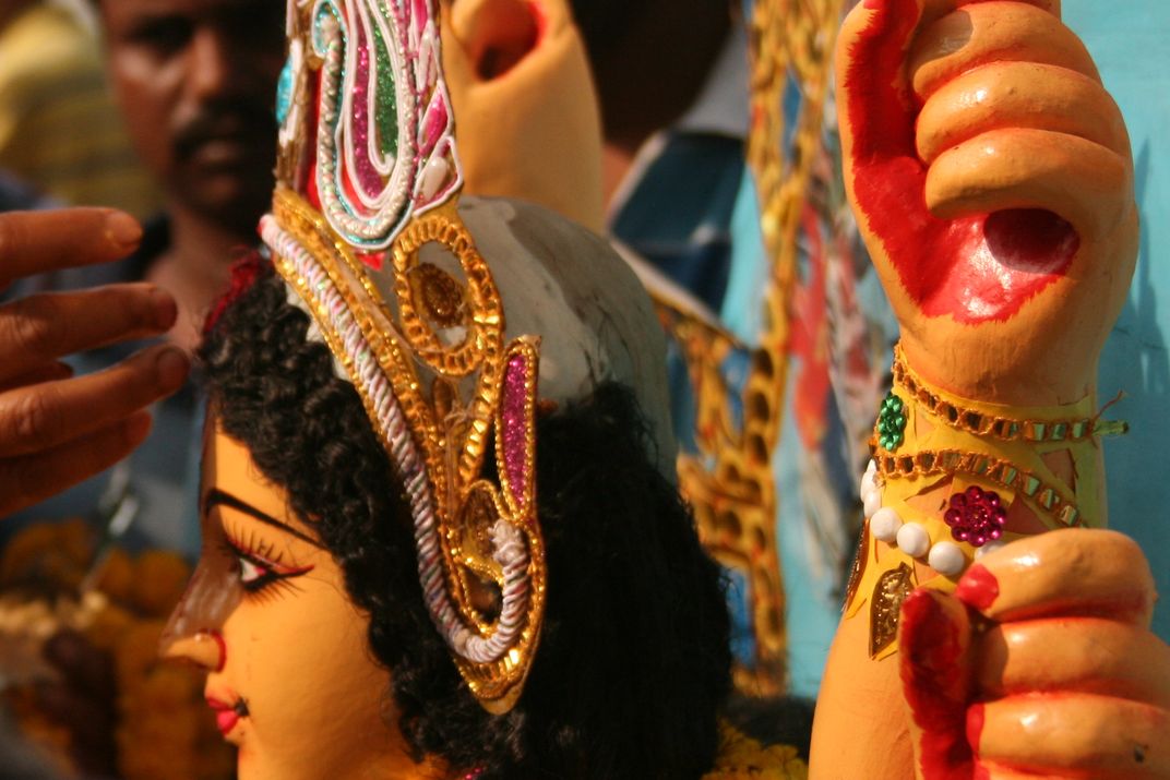 The Goddess Durga Receives Her Final Tikka Before Being Immersed In The