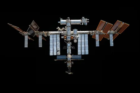 This mosaic depicts the International Space Station as pictured from the SpaceX Crew Dragon Endeavour in November 2021.