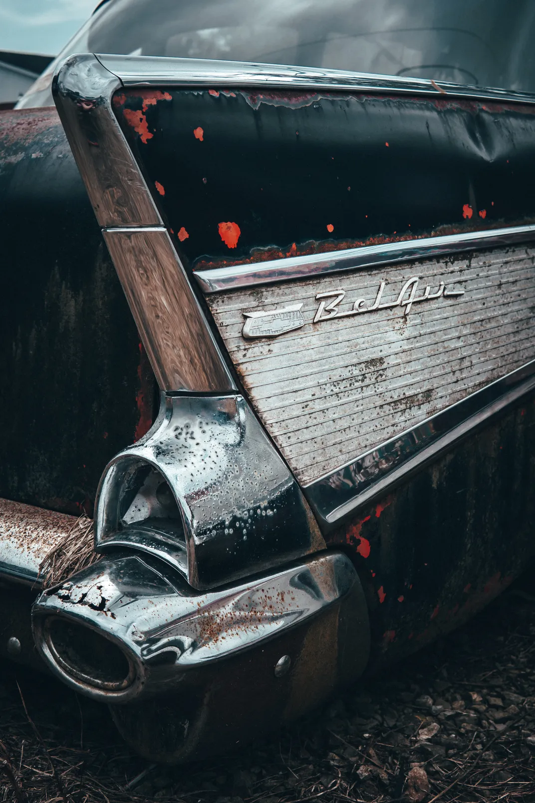 14 - Chipped paint and rust begin to take their toll on an abandoned 1957 Chevy Bel Air.