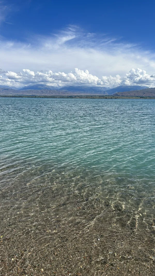 Pureness of Teal Waters, White Clouds, and Azure Sky thumbnail