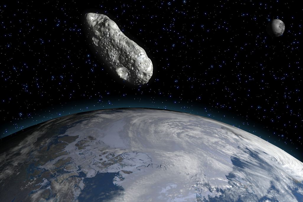 an asteroid flying through space above Earth, with the moon visible in the background