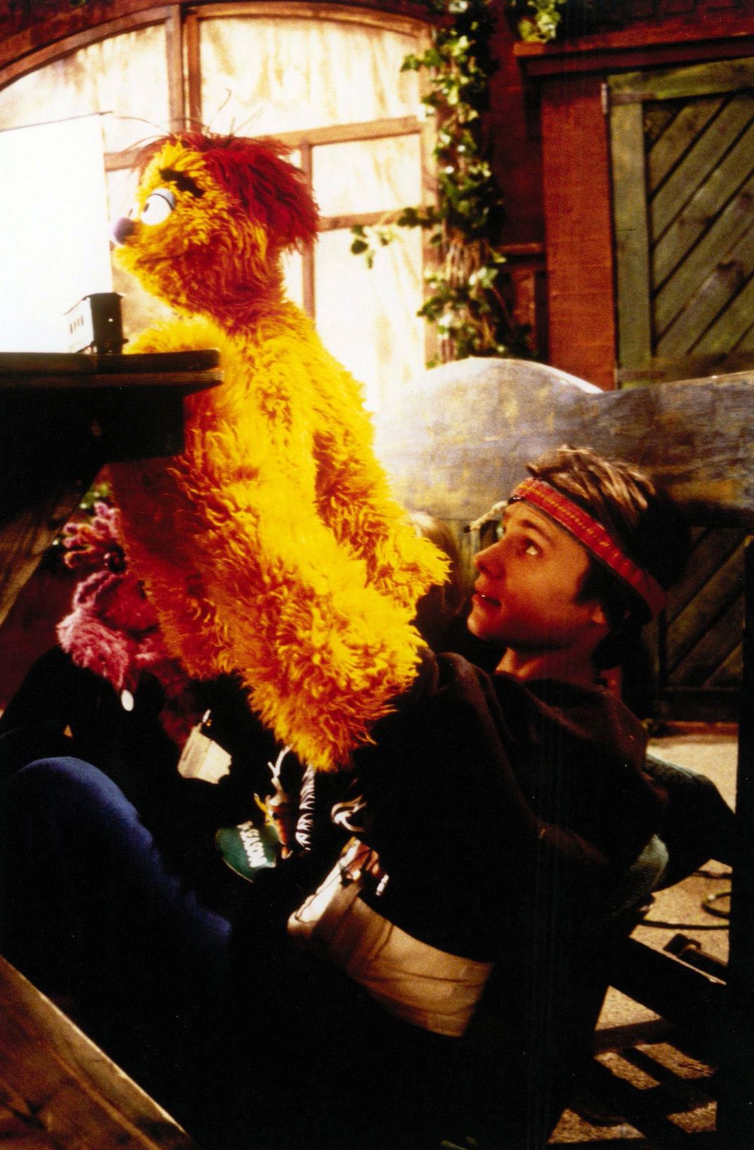 "Ulitsa Sezam" puppeteer performer Andrei Kuzichev, rehearsing with his Muppet, Kubik, in the studio.