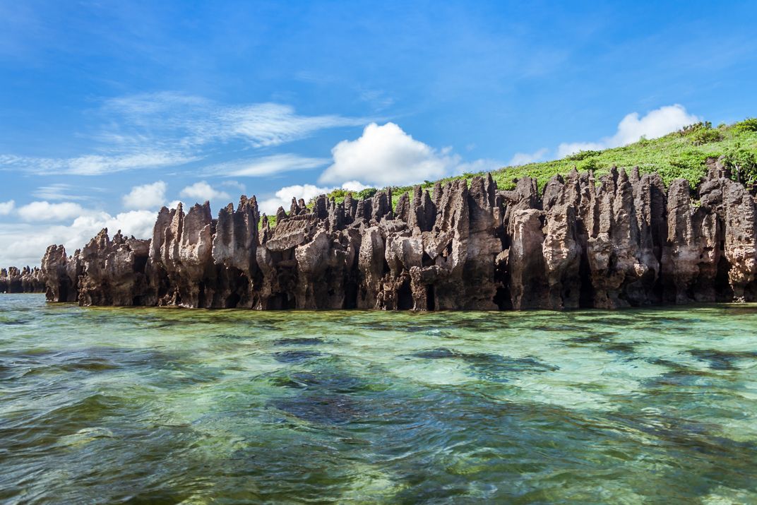 Karst cliffs on Emerald Bay near Antsiranana, Madagascar