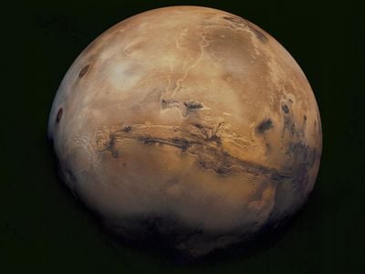 A mosaic of Mars images captured by the Viking Orbiter 1, which operated around the planet from 1976 to 1980. Valles Marineris, the largest canyon in the solar system, cuts across middle of the planet, stretching over 3,000 km long and up to 8 km deep. 

