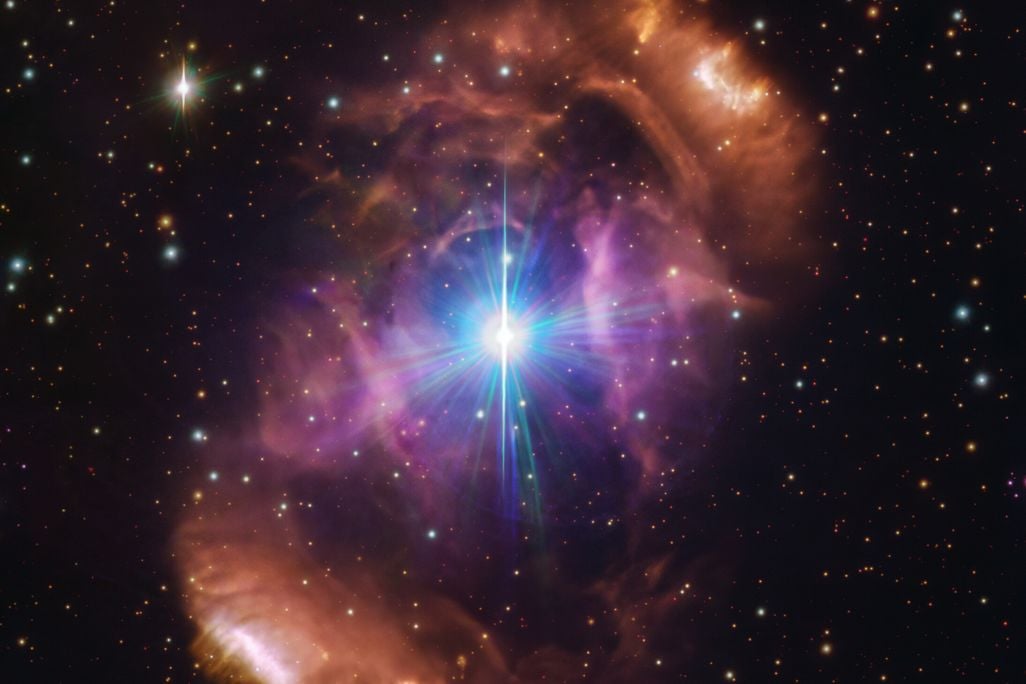 A close-up of the Dragon's Egg Nebula, with two "mismatched" stars inside.