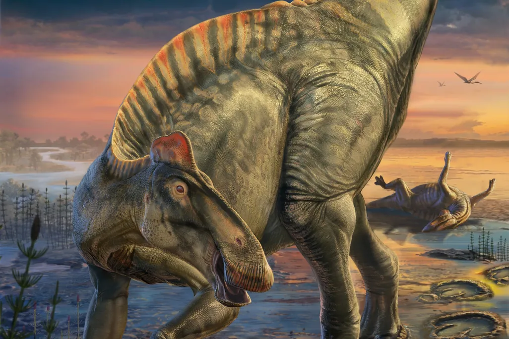 an artist's reconstruction of a dinosaur on a muddy bank