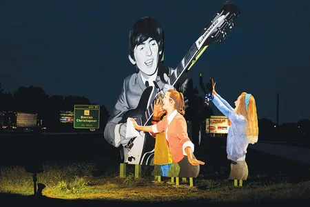 A billboard near Benton, Illinois. The rock 'n' roller from Liverpool was unknown in the States when he visited the town in 1963.