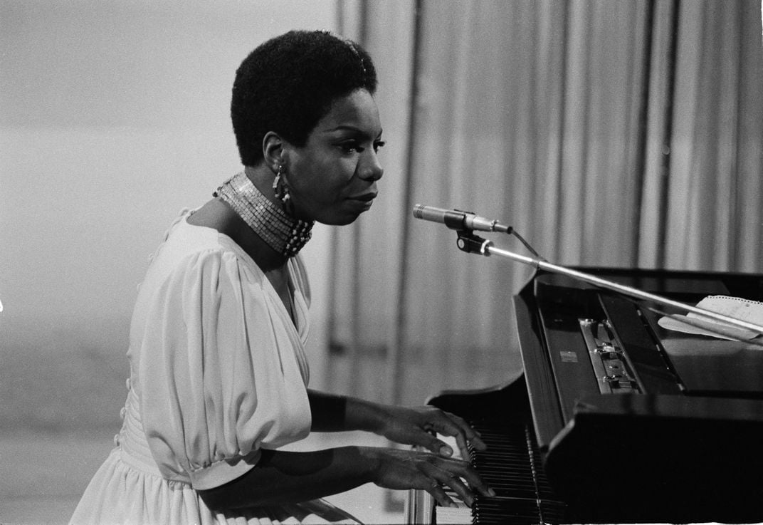 Nina Simone playing piano