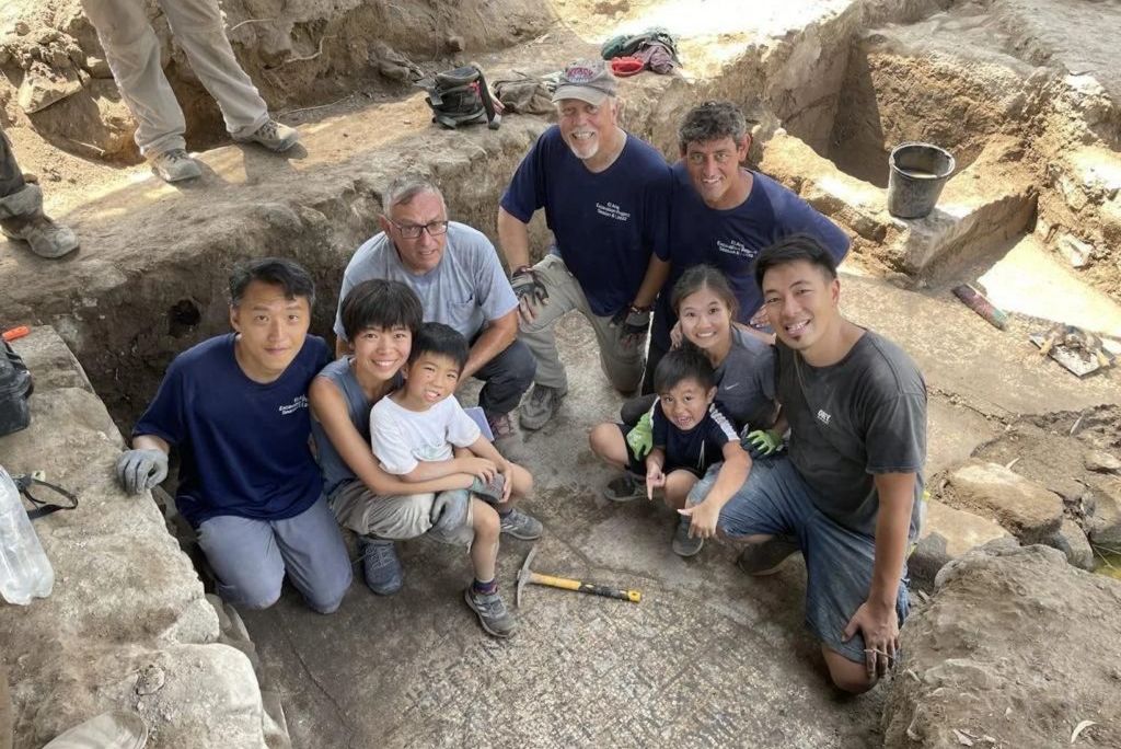 Archaeologists posing