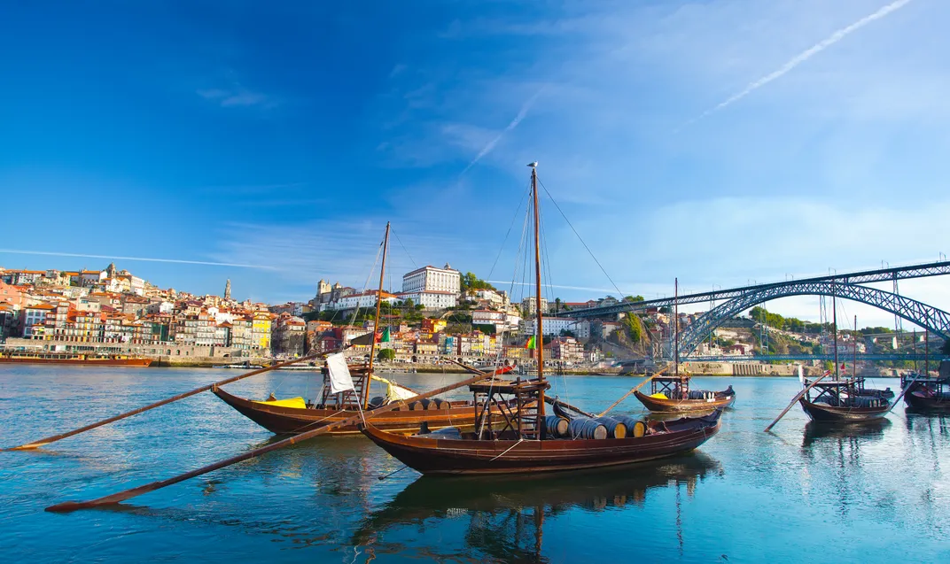 Traditional rabelo boats, used to transport port, on the Douro River in Porto