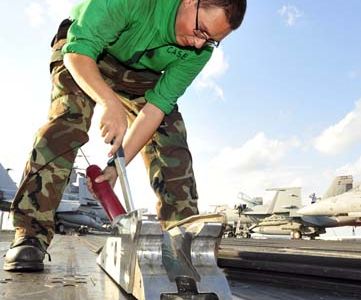 101014-N-0569K-032
ATLANTIC OCEAN (Oct. 14, 2010) Aviation Boatswain�s Mate (Equipment) Airman Recruit Joe R. Case performs pre-operation maintenance on a catapult on the flight deck of the aircraft carrier USS Enterprise. The Enterprise Carrier Strike Group is conducting a composite training unit exercise in preparation for an upcoming deployment. (U.S. Navy photo by Mass Communication Specialist Seaman Jared M. King/Released)