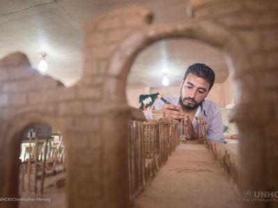 Mahmoud Hariri, from the city of Dara'a, is building a replica of the city of Palmyra from clay and wooden skewers.