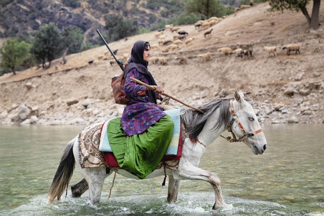 Mehri riding her horse