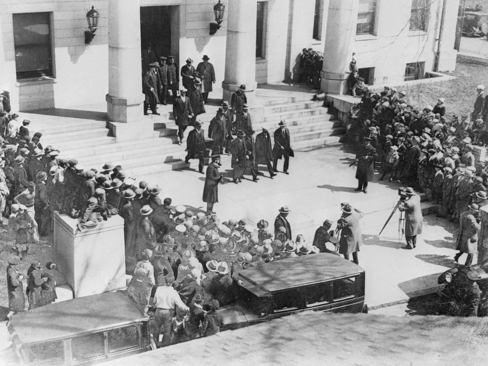 Sacco and Vanzetti leave the courthouse