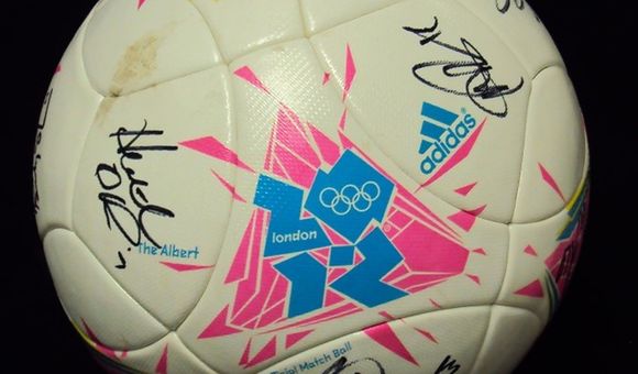 Adidas soccer ball autographed by the gold medal Women's National Soccer team from the 2012 Olympics.