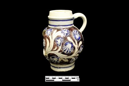 Tankard made in Westerwald, German , found along with lots of tanning debris in a privy 
associated with a small house on an alley that probably be
longed to tanner.   