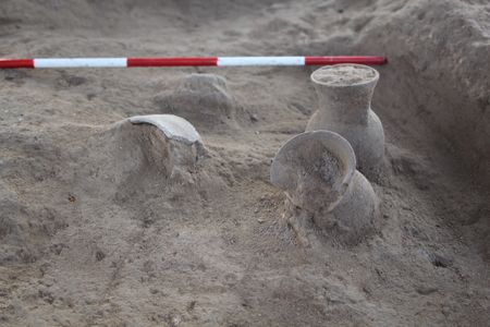Beer-drinking cups being excavated at Khani Masi held some of the earliest chemical evidence of beer. Researchers had to take extra precautions to avoid contaminating the cups with modern compounds.