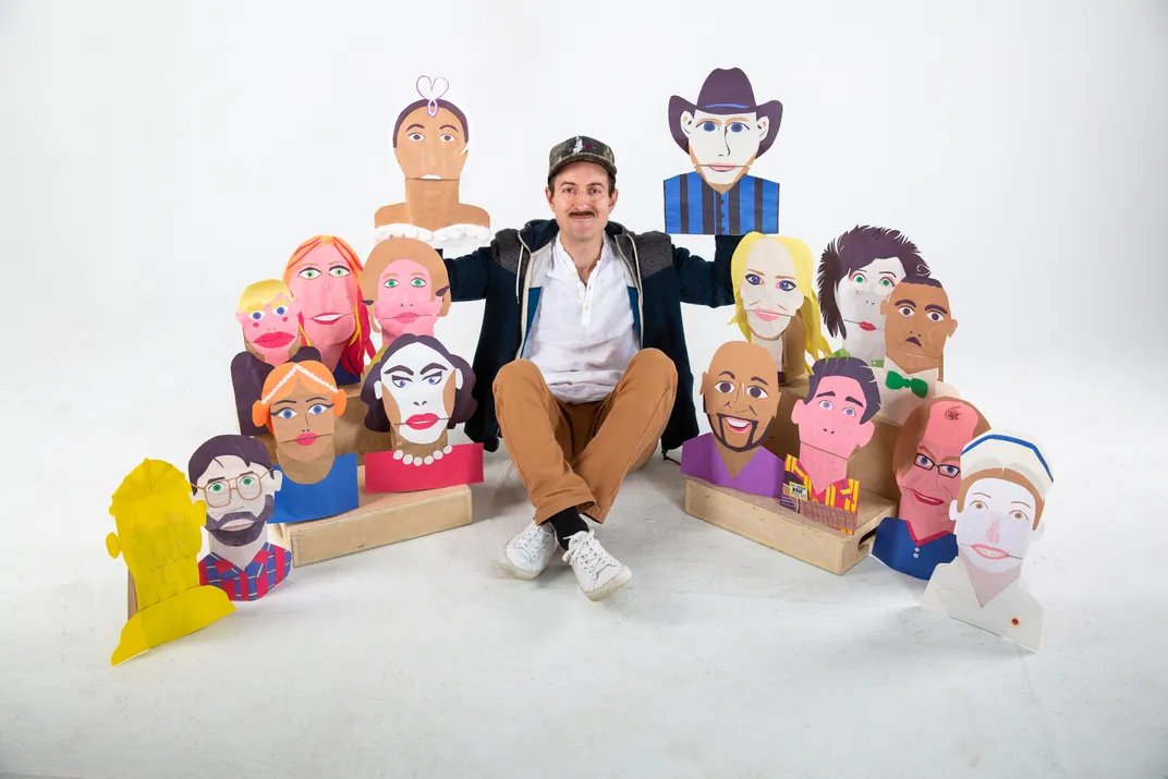 Jones poses with puppets from his interactive musical Oklahoma II.