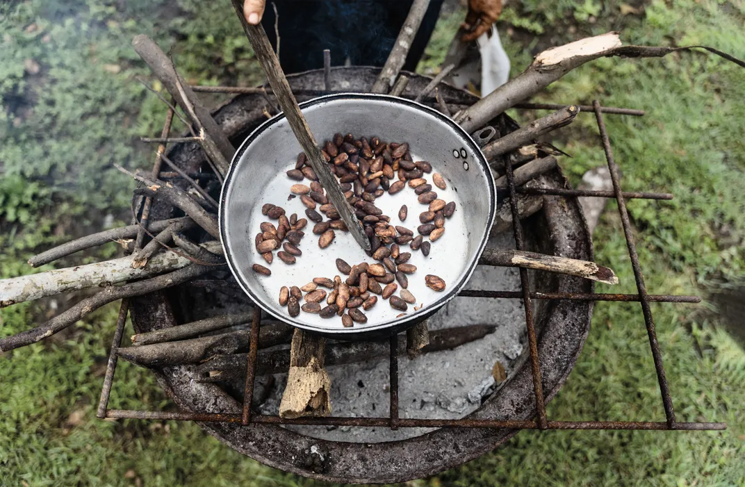 Farmer roasts cacao