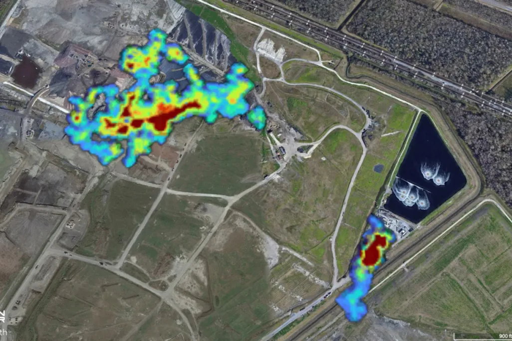 An aerial image of a landfill with a heat map showing methane emissions