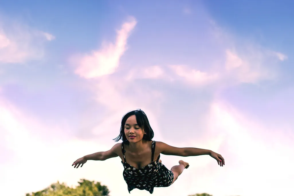 Woman Floating in the Sky
