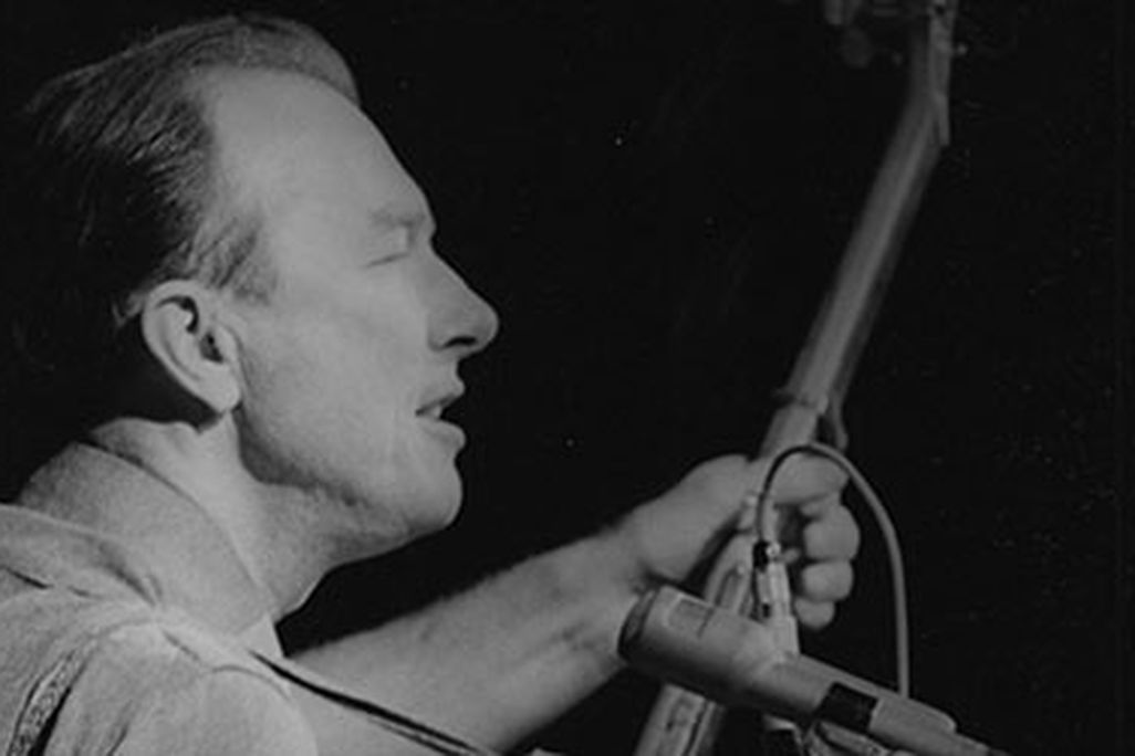 Pete Seeger performs at a peace rally in New York City, 1965.