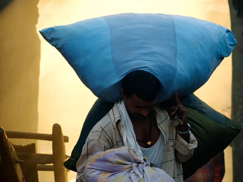 A dhobi coming out of the dhobi ghat | Smithsonian Photo Contest ...