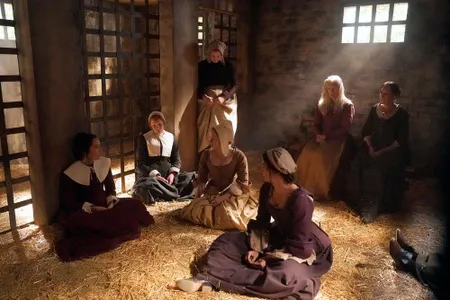 Lucy gets tossed in with the other accused witches in Salem.