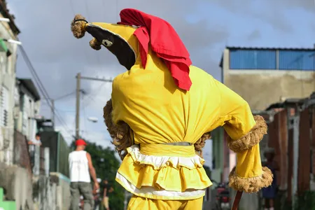 During an initiation ceremony for the Afro-Cuban secret society called Abakuá in the Havana district of Regla, a young aspirant depicts Aberisún, an ireme, or spirit messenger.