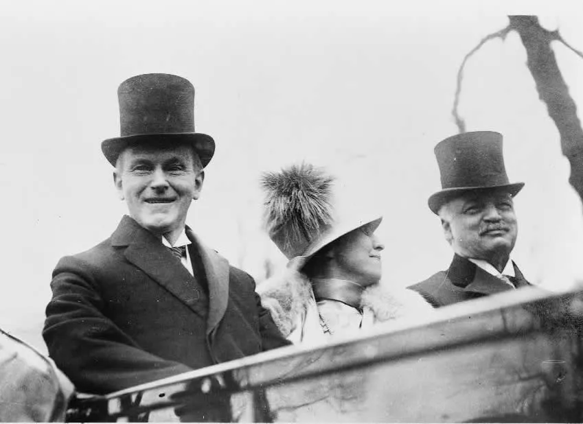 Charles Curtis, the first vice president of color, sits next to Calvin Coolidge and his wife, Grace Coolidge, in 1925.
