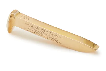 The spike is inscribed, "Presented to Col. Frederick Mears by the city of Anchorage in commemoration of the building of the Alaska Railroad 1915-1923."