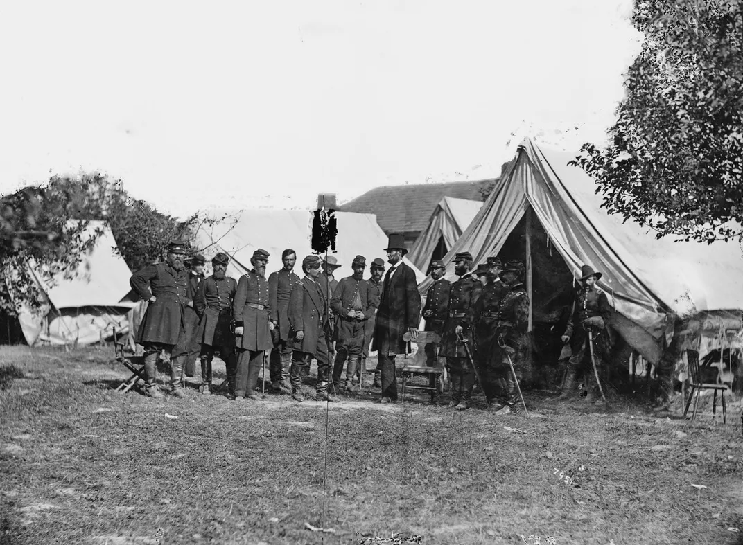 President Abraham Lincoln (wearing top hat) with George B. McClellan and other Union officers