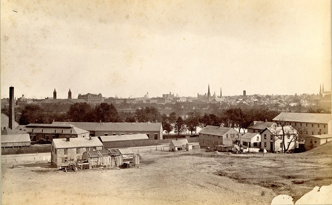 View south from Smith Hill with downtown Providence in the background, and residential buildings in the foreground