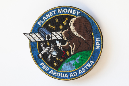 The mission patch for NPR's Planet Money satellite, featuring their famed squirrel. 