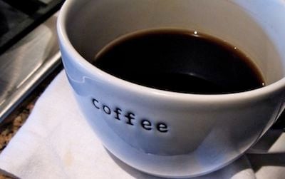 A new study shows that the equivalent of a few cups of coffee can help us process words more quickly and accurately.