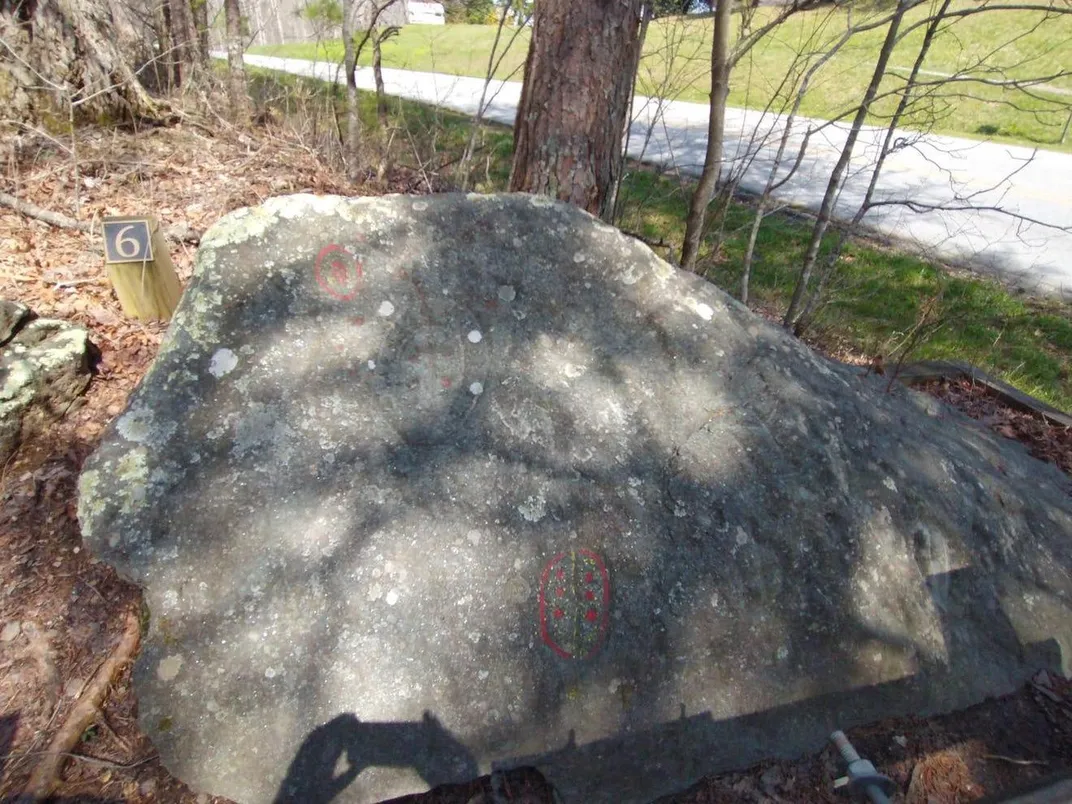 One of the vandalized boulders