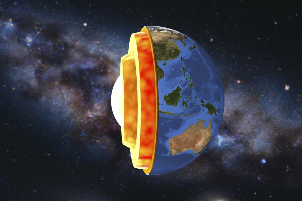 an illustration of half of Earth, its layers sticking out in sequence, showing the inner core, outer core, mantle and crust. the milky way is in the background