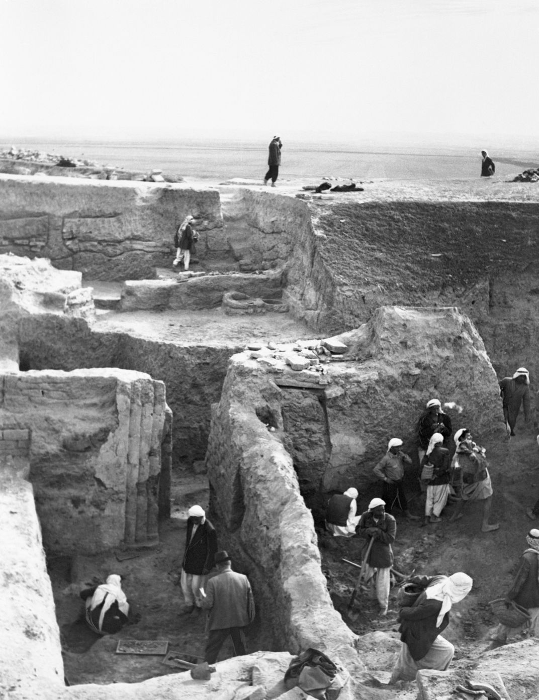 Max Mallowan supervises the excavation of an ancient          Assyrian fortress in Nimrud