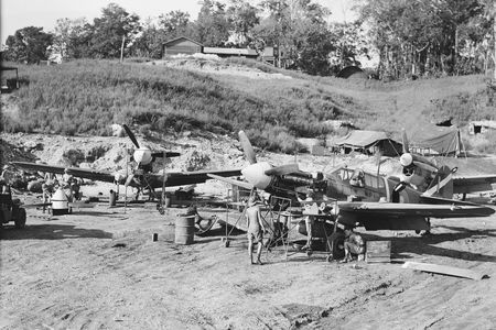 Ground crew servicing a group of Curtiss P-40 Kittyhawks. Presumed to be No. 1 Fighter Maintenance Unit at Kukum Field, Guadalcanal. (Photograph Courtesy of the Royal New Zealand Air Force Museum)