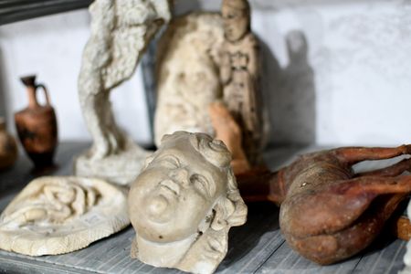Authorities recovered thousands of ancient artifacts, including these stone Roman statues. 