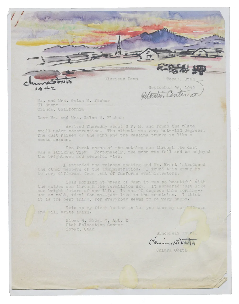 Typewritten letter with a black ink and watercolor sketch of a sunrise in purple, yellow, orange, and red behind bluish-purple mountains. In the foreground of the sketch are buildings and trucks of an incarceration camp.