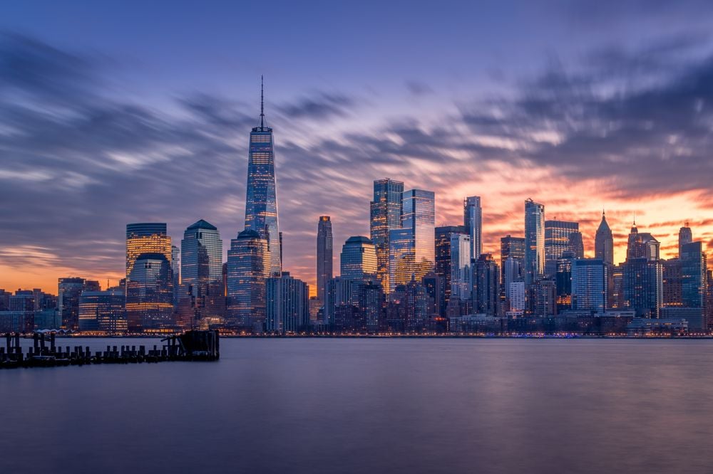 The sun rising behind the city that never sleeps.