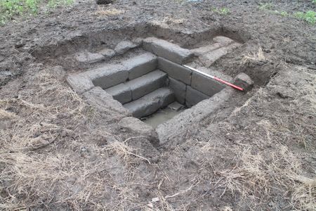 The historic St. Anne's Well after it was rediscovered and excavated.