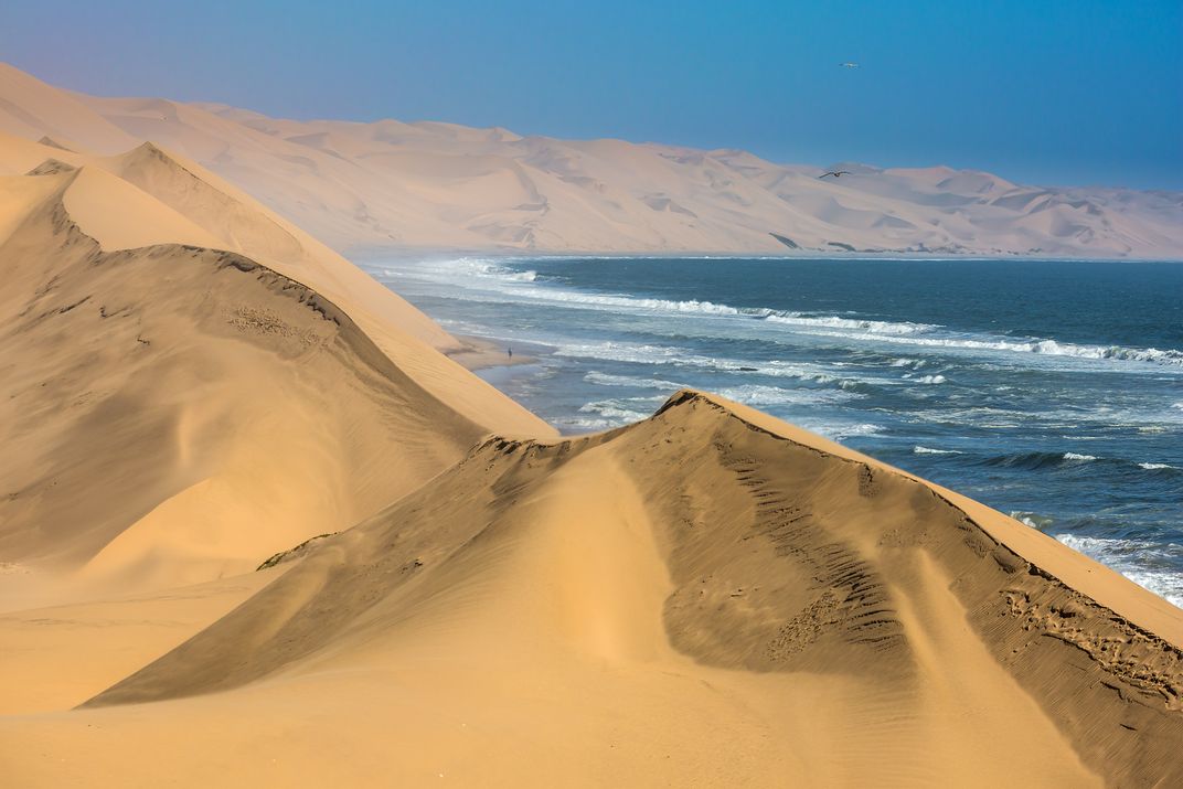 Surf meets the dunes in Walvis Bay