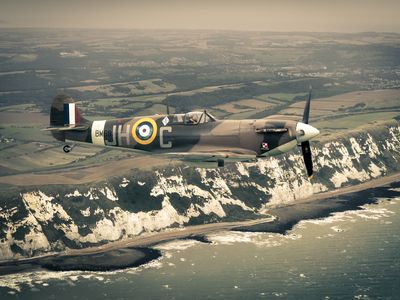 A Supermarine Spitfire Mk VB flies over the cliffs of Dover on Battle Of Britain Memorial Day, September 15, 2013.