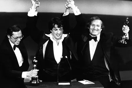 Producers Irwin Winkler, Sylvester Stallone, Robert Chartoff with their Academy Awards for Rocky, 1977