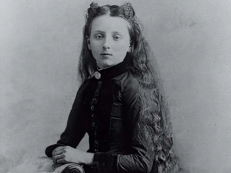 a black and white portrait of a child