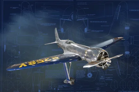 A photo illustration of a three-quarter view of a sliver aircraft with blue wings with blueprint in the background.