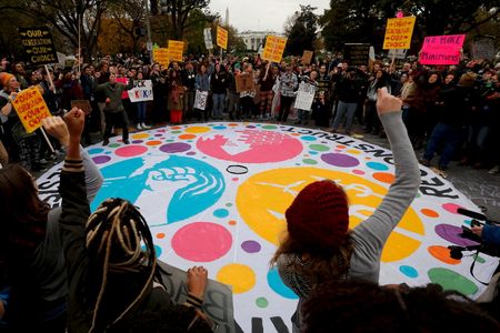 Youth gather near the White House as part of the "Our Generation, Our Choice" climate change march on November 9, 2015